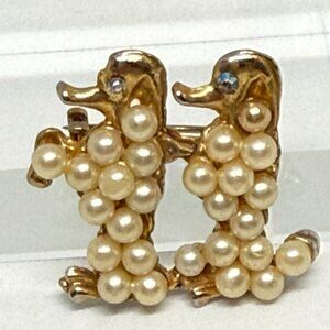 Vintage Goldtone and faux pearl poodle brooch.